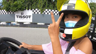Lovable Thai dilettante young boy sweetheart go karting and recorded on movie scene then